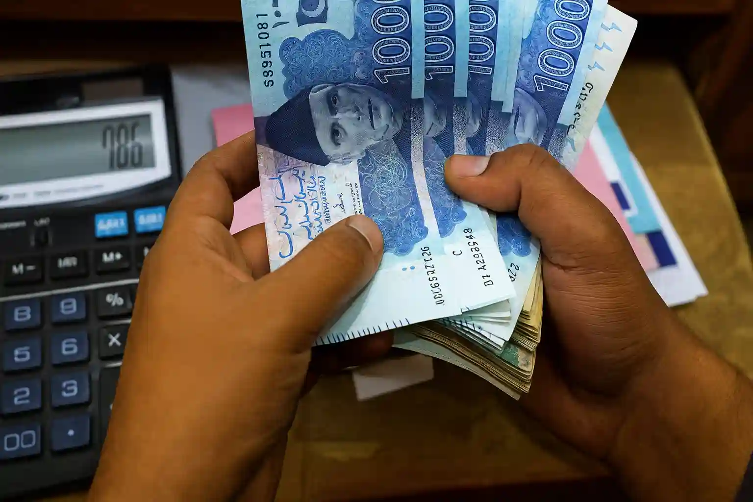 PM Economic Panel Calls for Rupee Realignment